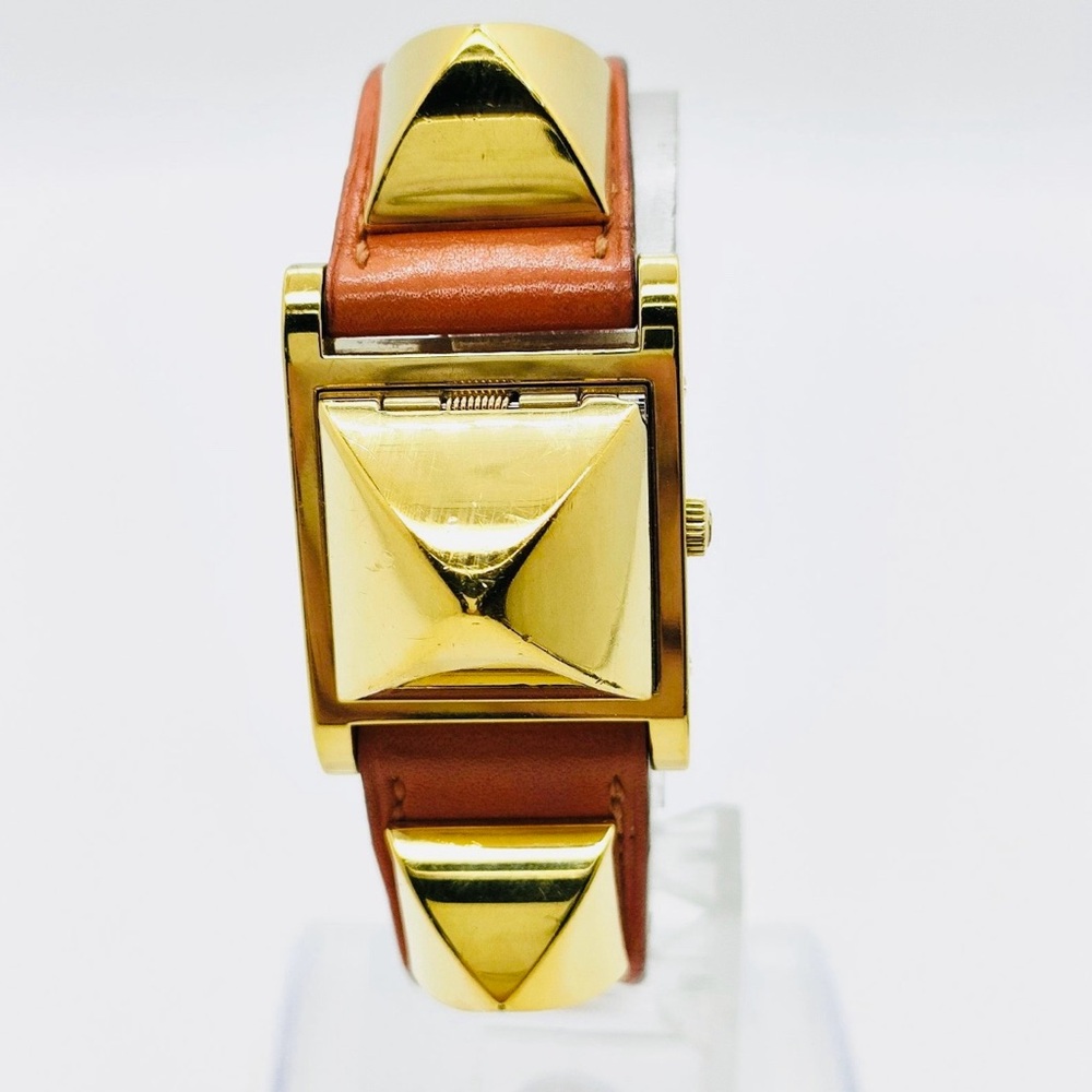 Hermes
Medor Quartz Watch Plated Metal and Leather 23 Tan / Orange